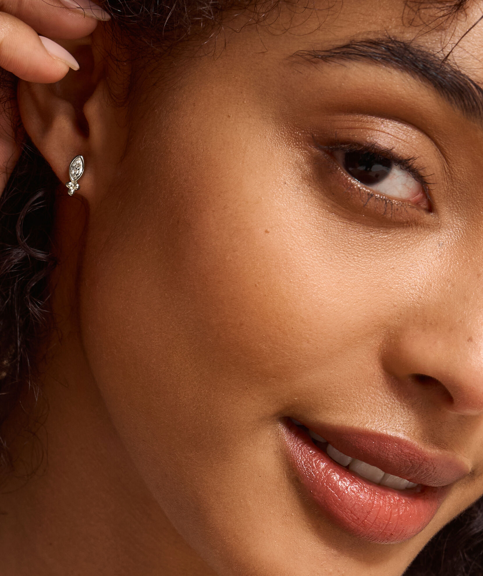 Dainty silver stud earrings top
